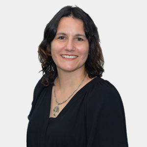 The photo was taken in the foreground, white background and Professor Debora Alcida Narbarlatz is located in the centre.