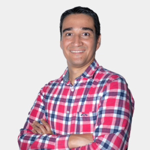 The photo was taken in the foreground, white background and Professor Jose Luis Herrera Celis is located in the centre.