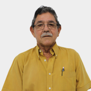 Professor Wilfredo del Toro Rodríguez of the School of Civil Engineering, UIS, is presented to the general public and the educational community. The photo was taken in close-up, with a white background, and the professor is positioned in the center.