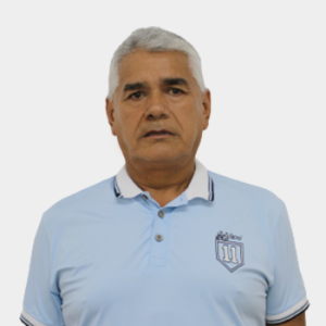 The professor of the Department of Physical Education and Sports, Carlos Fuentes Sandoval, is presented to the general public and the educational community. The photo was taken in close-up, with a white background, and the professor is positioned in the center.