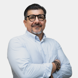 The photo was taken in the foreground, white background and Professor Alfonso Silva Rojas is located in the centre.