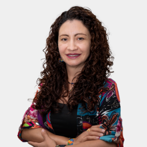 The photo was taken in the foreground, white background and Professor Ana Emilse Coy is located in the centre.