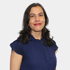 The photo was taken in the foreground, white background and Professor Brenda Escobar is located in the centre.
