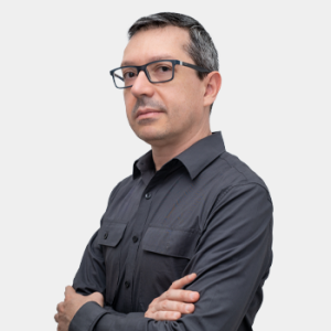 The photo was taken in the foreground, white background and Professor Mauricio Rincon Ortiz is located in the centre.