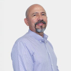 The photo was taken in the foreground, white background and Professor Nectali Ariza Ariza is located in the centre.